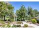 Picturesque community park featuring walking paths, mature trees, and a charming gazebo at 7849 Meandering Light Ave, Las Vegas, NV 89131