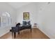 Living room with hardwood floors, a fireplace and lots of natural light at 7849 Meandering Light Ave, Las Vegas, NV 89131