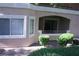 Charming condo featuring stucco siding, neutral color scheme, and a private patio with a sliding glass door and covered entry at 830 Carnegie St # 1011, Henderson, NV 89052