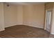 Spacious living room with neutral walls, carpet flooring, and access to a patio via a glass door at 830 Carnegie St # 1011, Henderson, NV 89052
