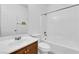 Clean bathroom featuring a vanity and shower-tub combo at 8562 Burning Bridge Ct, Las Vegas, NV 89131