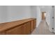 Hallway features plenty of cabinet storage and light-colored tiled floors at 8562 Burning Bridge Ct, Las Vegas, NV 89131