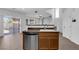 Kitchen features a stainless steel dishwasher, sink, and seamless transition to the outdoors at 8562 Burning Bridge Ct, Las Vegas, NV 89131