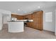 Well-equipped kitchen with tiled floors, stainless steel appliances, and ample cabinet space at 8562 Burning Bridge Ct, Las Vegas, NV 89131