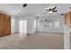 Bright, open living area with neutral walls and tile flooring at 8562 Burning Bridge Ct, Las Vegas, NV 89131