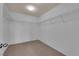 Walk-in closet with carpet flooring and wire shelving at 8562 Burning Bridge Ct, Las Vegas, NV 89131