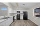 Modern kitchen with stainless steel appliances and ample counter space at 905 Harp Way, North Las Vegas, NV 89032