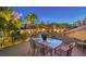 Cozy balcony with outdoor dining set and panoramic views of the surrounding landscape at 9135 Hickam Ave, Las Vegas, NV 89129