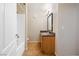 Bathroom featuring a bathtub, vanity with granite countertop, and tiled floors at 9325 W Desert Inn Rd # 104, Las Vegas, NV 89117
