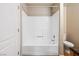 Clean bathroom featuring a white shower and tiled flooring at 9325 W Desert Inn Rd # 104, Las Vegas, NV 89117