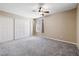 Carpeted bedroom with closet and window at 9325 W Desert Inn Rd # 104, Las Vegas, NV 89117