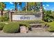 Elegant community sign with stone accents and lush landscaping welcoming residents and visitors at 9325 W Desert Inn Rd # 104, Las Vegas, NV 89117
