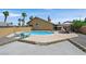 Private backyard pool perfect for relaxing, along with desert landscaping and nice patio area at 100 Crossfoot Terrace Ct, Henderson, NV 89002