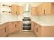 Close-up of kitchen featuring stainless steel appliances and marble countertops at 1025 Appaloosa Hills Ave, North Las Vegas, NV 89081