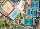 Overhead view showcases a community pool, tennis courts, and recreation center with mature landscaping at 10413 Marymont Pl, Las Vegas, NV 89134