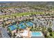 Panoramic view of Sun City Summerlin with lush landscaping and multiple tennis courts at 10413 Marymont Pl, Las Vegas, NV 89134