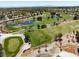 Expansive golf course showcasing the lush greens, water features, and community in a well-maintained area at 10413 Marymont Pl, Las Vegas, NV 89134