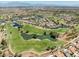 Overhead view of the golf course, showcasing the numerous ponds, manicured greens, and a community setting at 10413 Marymont Pl, Las Vegas, NV 89134