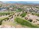 Beautiful golf course view with rolling hills and distant mountains, offering a picturesque and serene landscape at 10413 Marymont Pl, Las Vegas, NV 89134