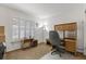 Well lit office area with a large window, and a comfortable desk and chair setup at 10413 Marymont Pl, Las Vegas, NV 89134