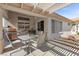 Comfortable covered patio area perfect for outdoor dining and relaxation with a BBQ grill at 10413 Marymont Pl, Las Vegas, NV 89134