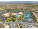An aerial view of the community center, showing the pool, tennis courts, and ample parking at 10413 Marymont Pl, Las Vegas, NV 89134