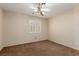 Empty bedroom with a ceiling fan and window at 1054 Broomfield Dr, Henderson, NV 89074