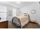 Bright bedroom with a cozy bed, soft lighting, and stylish decor, creating a relaxing retreat at 10863 Gardenova Ave, Las Vegas, NV 89166