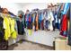 Walk-in closet featuring shelving and hanging storage for clothes and accessories at 10863 Gardenova Ave, Las Vegas, NV 89166