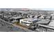 An aerial shot shows the property's location within a well-developed neighborhood and beautiful mountain views at 11015 Sanctuary Cove Ct, Las Vegas, NV 89135