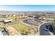 Aerial view of community park including playground, sports field, and parking area at 11015 Sanctuary Cove Ct, Las Vegas, NV 89135