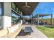 Spacious backyard patio featuring stylish furniture, outdoor dining, and a modern fire pit at 11015 Sanctuary Cove Ct, Las Vegas, NV 89135