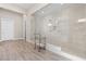 Contemporary bathroom featuring a glass shower and modern fixtures at 11015 Sanctuary Cove Ct, Las Vegas, NV 89135