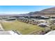 Large community park featuring green space, play areas, and mountain views for outdoor enjoyment at 11015 Sanctuary Cove Ct, Las Vegas, NV 89135