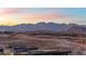 Stunning mountain views at sunset, showcasing the beautiful desert landscape at 11015 Sanctuary Cove Ct, Las Vegas, NV 89135