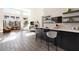 Spacious living space with a wet bar and a view of the backyard at 11015 Sanctuary Cove Ct, Las Vegas, NV 89135