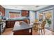 Bright kitchen with stainless steel appliances and access to the backyard at 11620 Longhirst Hall Ln, Las Vegas, NV 89138