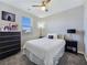 Cozy bedroom featuring a comfortable bed, stylish decor, and a bright window at 11739 Emerald Lake Ave, Las Vegas, NV 89138