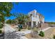 Modern two-story home with drought-resistant landscaping, pedestrian sidewalk and convenient community mailbox at 11739 Emerald Lake Ave, Las Vegas, NV 89138