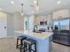 Stylish kitchen equipped with an island, stainless steel appliances, and ample cabinet space at 11739 Emerald Lake Ave, Las Vegas, NV 89138