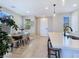 Open kitchen and dining area with an island, offering a modern and inviting living space at 11739 Emerald Lake Ave, Las Vegas, NV 89138