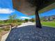 Relaxing park with shaded structure, benches, desert landscaping, and green space at 11739 Emerald Lake Ave, Las Vegas, NV 89138