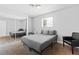 Cozy bedroom features gray walls, carpet, and a mirrored closet at 120 W Highland Dr, Henderson, NV 89015