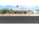 Charming single-story home with desert landscaping and a two-car garage at 120 W Highland Dr, Henderson, NV 89015