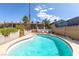 Beautiful backyard pool surrounded by lush landscaping perfect for outdoor entertaining at 120 W Highland Dr, Henderson, NV 89015