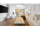 Spacious living room featuring hardwood floors and modern decor throughout at 120 W Highland Dr, Henderson, NV 89015