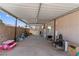 Spacious covered backyard area, perfect for storage, outdoor projects, or recreational activities at 1310 Ripplestone Ave, North Las Vegas, NV 89081
