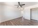 Bedroom featuring wood-look floors and a closet for storage at 1313 Purple Sage Ave, Las Vegas, NV 89108