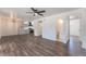 Open-concept living room with hardwood floors connecting to the kitchen at 1313 Purple Sage Ave, Las Vegas, NV 89108