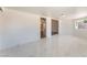 Bright living room featuring white walls and luxury vinyl floors at 1313 Purple Sage Ave, Las Vegas, NV 89108